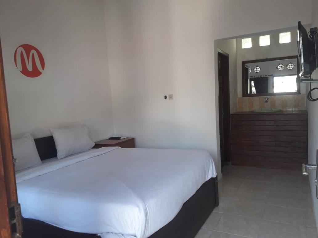 Mugeni Homestay Senggigi Extérieur photo