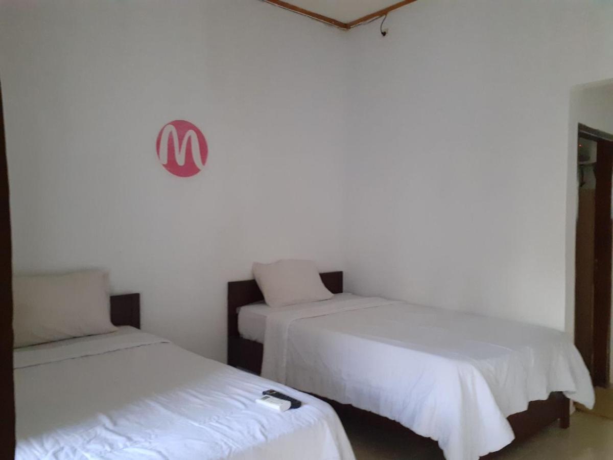 Mugeni Homestay Senggigi Extérieur photo
